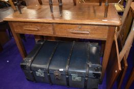 A 1930s golden oak desk or side table having two frieze drawers, approx. 106 x 60cm