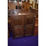 A late 19th/early 20th Century Art Nouveau oak side cabinet in the Liberty style