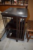 An Edwardian mahogany revolving bookcase