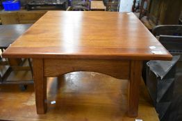 A stained frame coffee table having pitch pine base, square top approx. 61 x 61cm