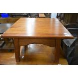 A stained frame coffee table having pitch pine base, square top approx. 61 x 61cm