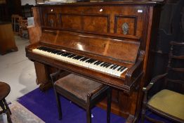 A 19th Century walnut cased upright piano , labelled for J G Irmler, Leipzig, and a stained frame