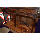 A pair of Oriental style mahogany side tables having galleried tops