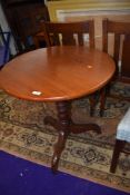 A part Victorian pedestal table having turned column and triple splay legs, top possibly replaced,