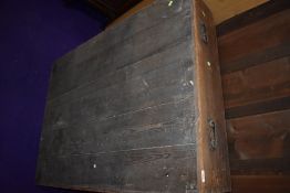 A large pine underbed style storage chest having interesting treen casters, dimensions approx.W125