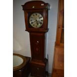 An early 20th Century mahogany low height, long case clock having inlay decoration to trunk and