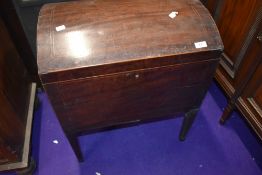 A Regency mahogany and inlaid dome top cellarette, having brass handles and tapered legs, no