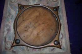 An Arts and Crafts style copper mirror or picture frame , width 42cm