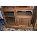 A natural pine entertainment or similar cabinet