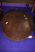 An Edwardian mahogany oval tray (some damage to gallery) and an unrelated oak frame, possibly for