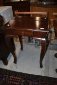 A hardwood side table having frieze drawer