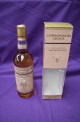 A bottle of Connoisseurs Choice Islands Single Malt Scotch Whisky, distilled in 1990 at Ledaig