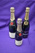 A bottle of Moet & Chandon Premier Cuvee Champagne 75cl, a half bottle of Moet & Chandon Brut