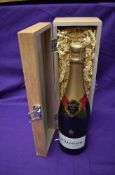 A bottle of Bollinger Special Cuvee Champagne Brut, 75cl, 12% Vol in wooden box