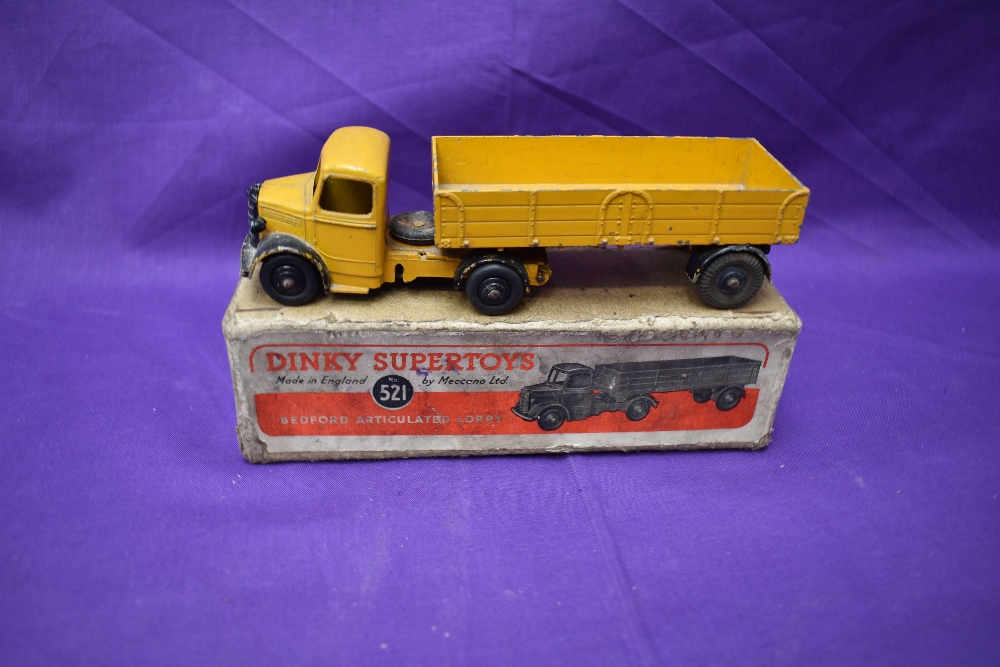 A Dinky Supertoys diecast, Bedford Articulated Lorry, yellow body and cab with black mudguards and