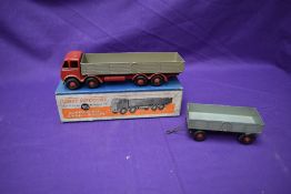 A Dinky Supertoys diecast, Foden Diesel 8-Wheel Wagon having grey body, red cab and chassis, in