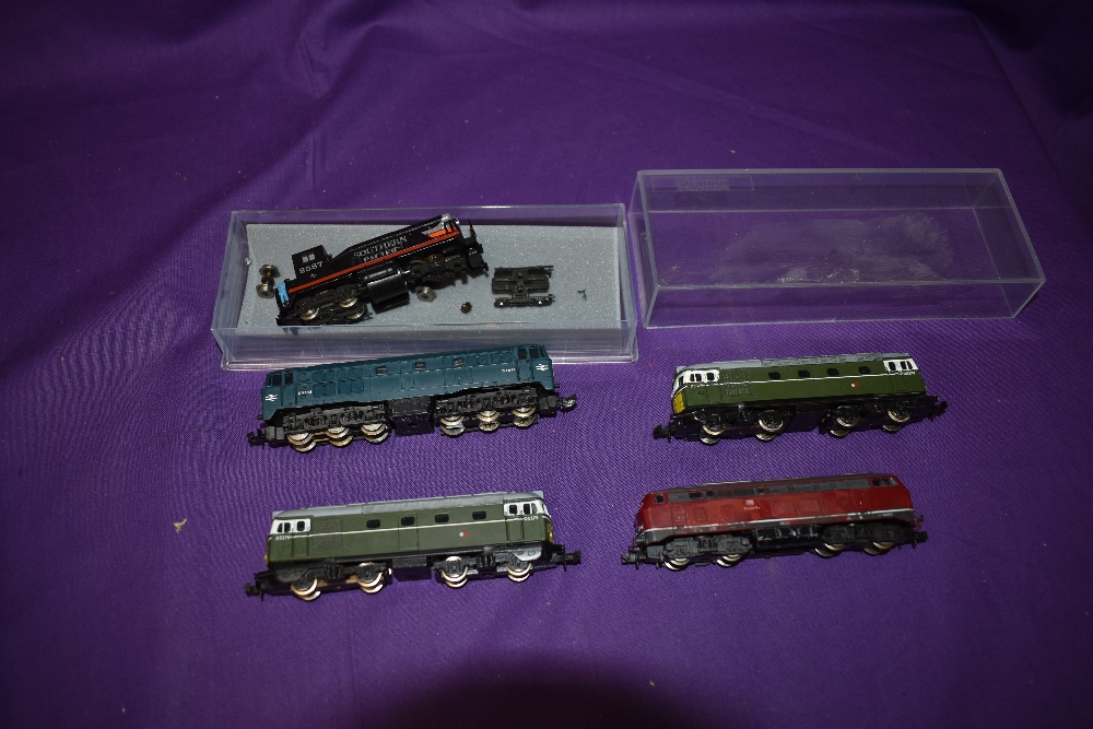 Four Lima, Fleischmann Piccolo and Trix N gauge Diesel Locomotives and a similar Southern pacific