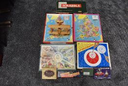 A small selection of vintage games including Scrabble, Spirograph, Colour Dominoes, Victory Jig-Saws