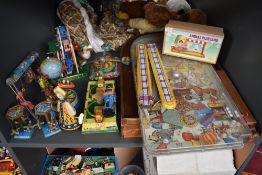 A shelf of mixed vintage Tin Plate Toys including Fairground Rides (China) Trains (germany), a State