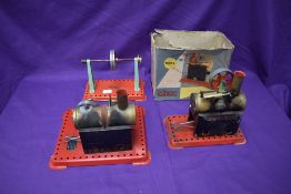 A Mamod Live Steam MM2 Stationary Engine, part boxed along with a Mamod Live Steam Plant having