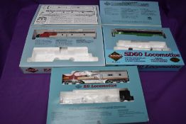 Three Proto Series 2000 HO scale Locomotives, Santa Fe E8/9 boxed 8035, limited edition BNSF SD60