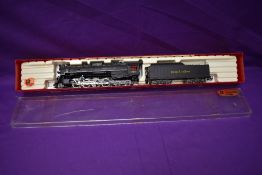 A Rivarossi HO scale 2-8-4 NYC & STL Nickel Plate Road Loco & Tender 779, in original display box