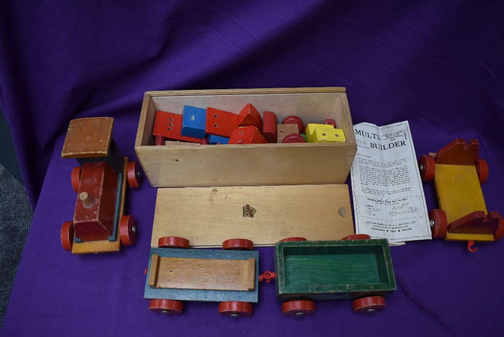 A NicolToys wooden Multi Builder part set MB1, with instructions and in original box along with a
