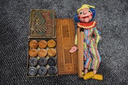 A Pelham Puppet Clown having moveable wooden mouth, a wooden Cribbage board and a set of wooden