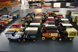 A collection of Lledo diecast Brewery, Whisky and similar Alcohol advertising Vans, Horse Drawn