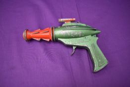 A Lone Star diecast playworn Stingray Gun, appears in working order