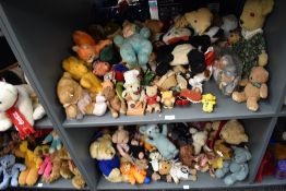 Two shelves of mixed vintage Teddy Bears, Dolls and hand puppets including Knickerbocker, Russ, TY