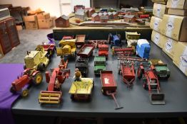 A collection of Dinky, Corgi and similar diecast agricultural and construction playworn vehicles and