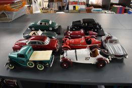A collection of 1:18 scale diecasts, Solido Ford V8, Burago Mercedes 300SL, Jaguar E 1961,Mercedes