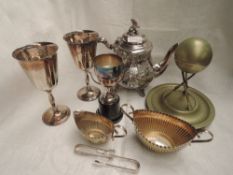 A small selection of silver plate including a teapot, goblets, rifle shooting trophy, sugar bowls