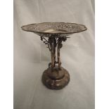 A late 19th/early 20th Century Chinese silver table comport having three moulded Cranes on an
