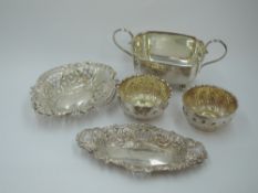 Five pieces of HM silver including two trinket dishes of small boat form having pierced