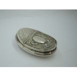 An early 20th Century Chinese silver snuff box of curved oval form having engraved dragon to base