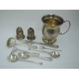 A selection of HM silver including cruet set, flatware and a small silver mug of baluster form