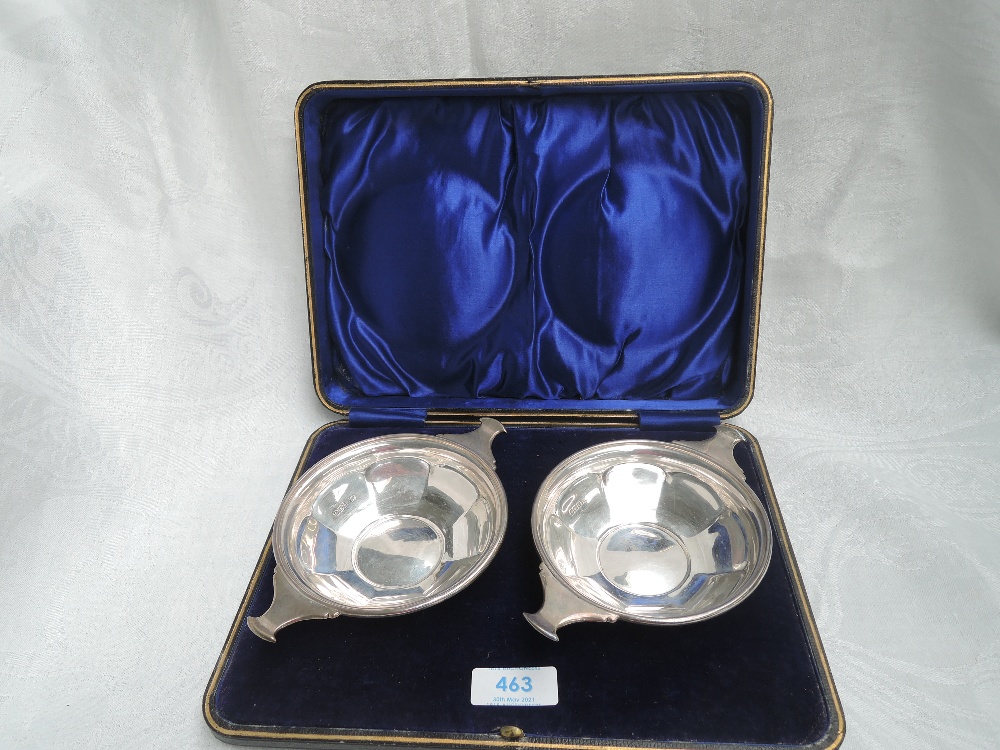 A cased pair of early 20th Century silver quaichs of circular form having facetted decoration to - Image 2 of 3