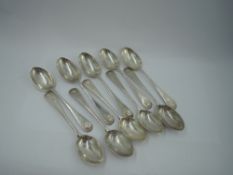 Ten Victorian/Edwardian silver teaspoons of Old English form having scallop shell terminals and