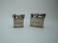 Two Mexican silver cigarette lighters, both of same design and having engraved initials to sides