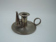 A Georgian silver chamber stick of small plain form having ring handle, detachable sconce and