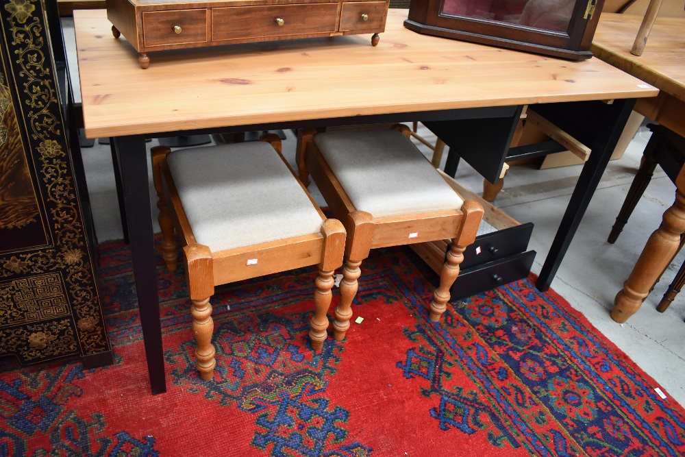 A modern pine top desk, with black ash effect frame, width approx. 140cm