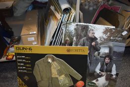 A selection of advertising boards for country clothing Beretta etc