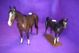 Two Beswick studies, Imperial, brown, model no 1557 and Arab Xayal, dark brown, model no 1265