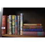 A collection of vintage and antique books including Gullivers travels,Swiss family Robinson,Jane