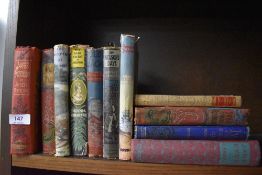 A collection of vintage and antique books including Gullivers travels,Swiss family Robinson,Jane