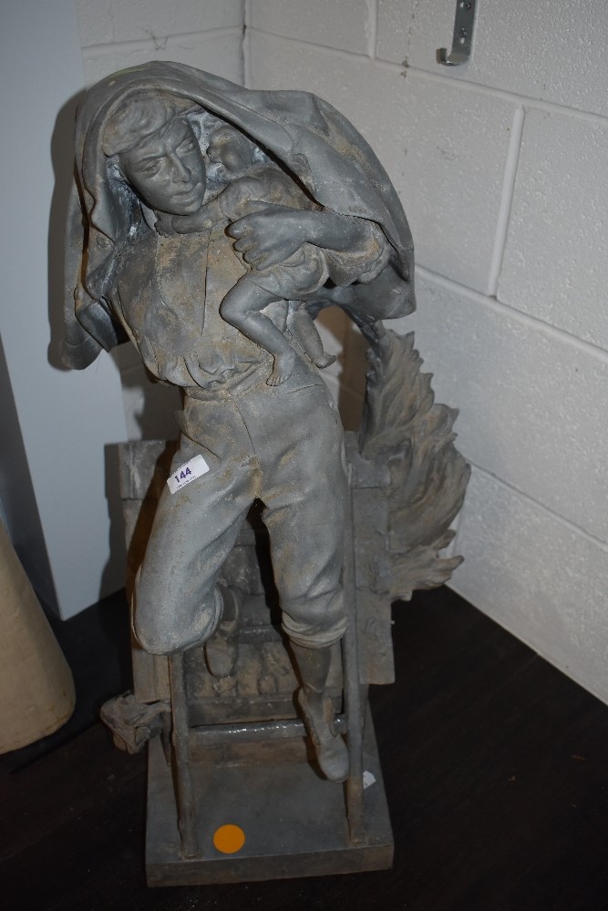 A large cast spelter garden figure/statue of period dressed man rescuing a child from a burning
