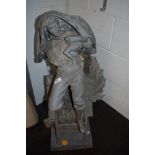 A large cast spelter garden figure/statue of period dressed man rescuing a child from a burning