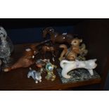 A collection of animal figurines including Beswick blue tit and chaffinch, Royal Doulton pony and